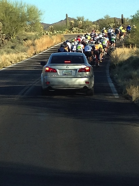 A motorist snaps a photo of the Tuesday-morning ride taking up the entire lane along Kinney Road. 