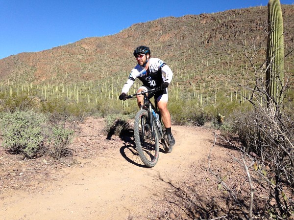Cory Foster rides a new section of trail that bypasses the Yetman Wash.
