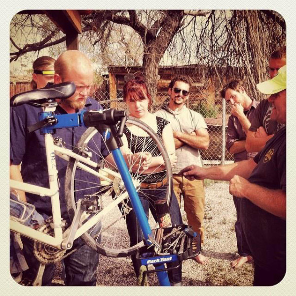 Both photos are from our Bike Mechanics class (in partnership with Pima County Bike and Ped) at Arizona Conservation Corps, where we teach low income young folks the basics of biking and then provide them with a used bike to borrow for commuting while they are working with us. Photo by Jenna Rosengren.