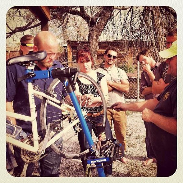 Photo 17:  Bike Mechanics class (in partnership with Pima County Bike and Ped) at Arizona Conservation Corps