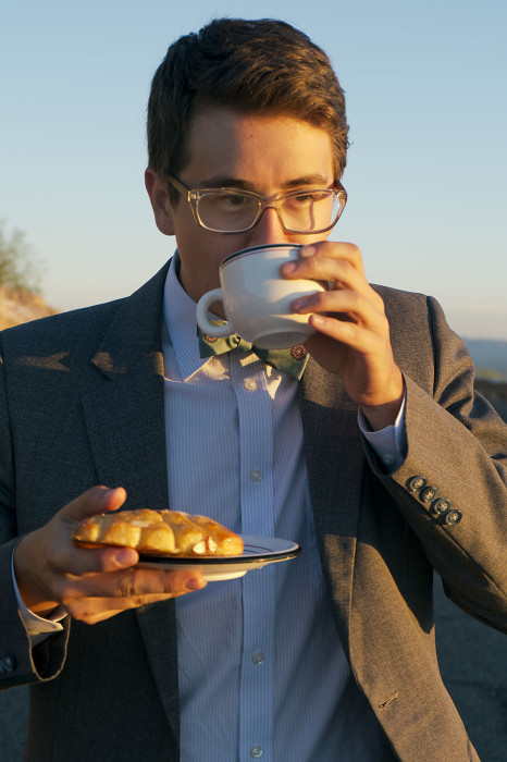 One must drink tea with a cup and saucer and in a sport coat. 