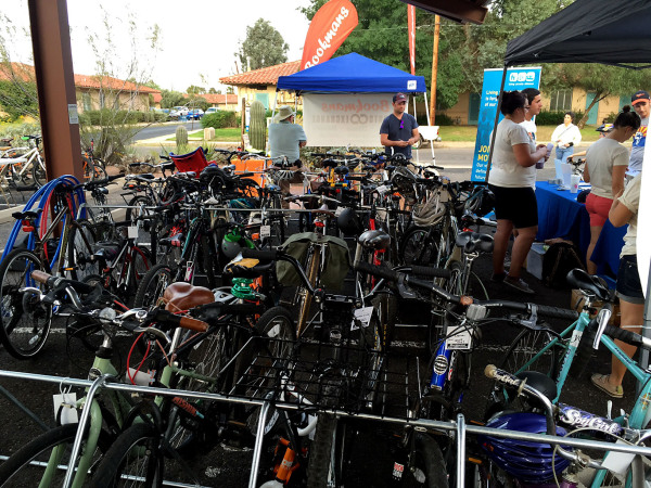 Dozens of bikes are lined up in the Living Streets Alliance bike valet sponsored by Bookman Sports. 