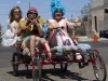 Members of the Parasol Project bike through the streets of Tucson in the Bike Beautiful procession during Cyclovia, a car-free day of bike riding, in Tucson Ariz on 28 March 2011.  The Parasol project organized the Bike Beautiful procession to celebrate the beauty of bike culture.